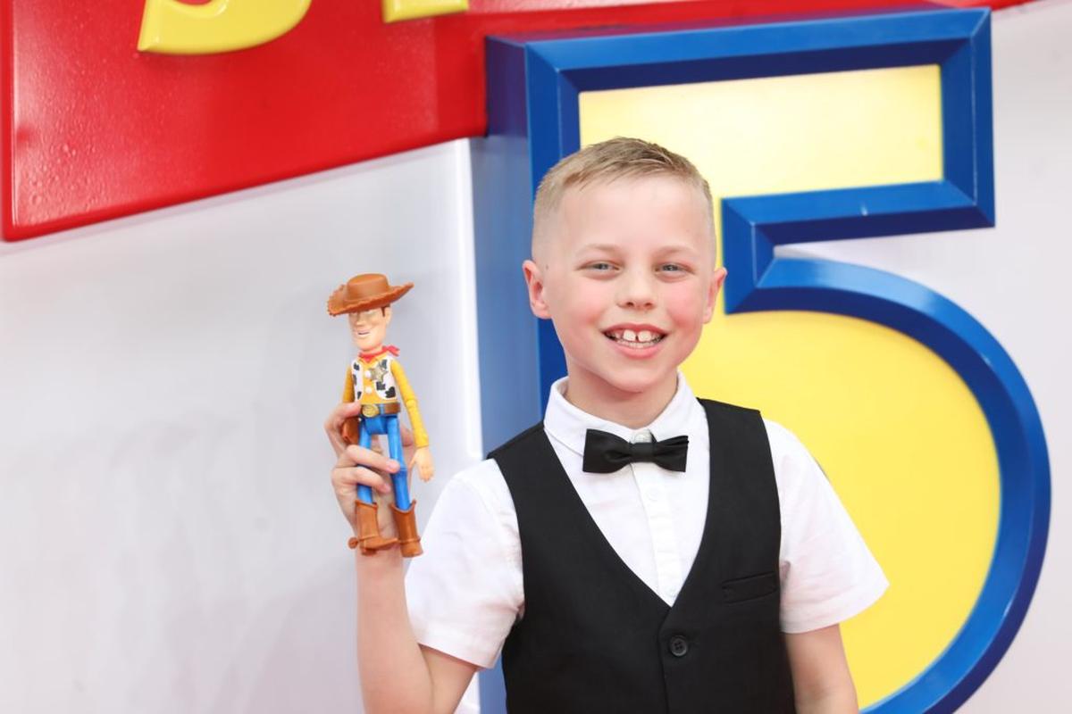  Now 10-year-old Vinny Donnelly on the red carpet at the premiere of "Toy Story 5". (William Lailey via SWNS) 