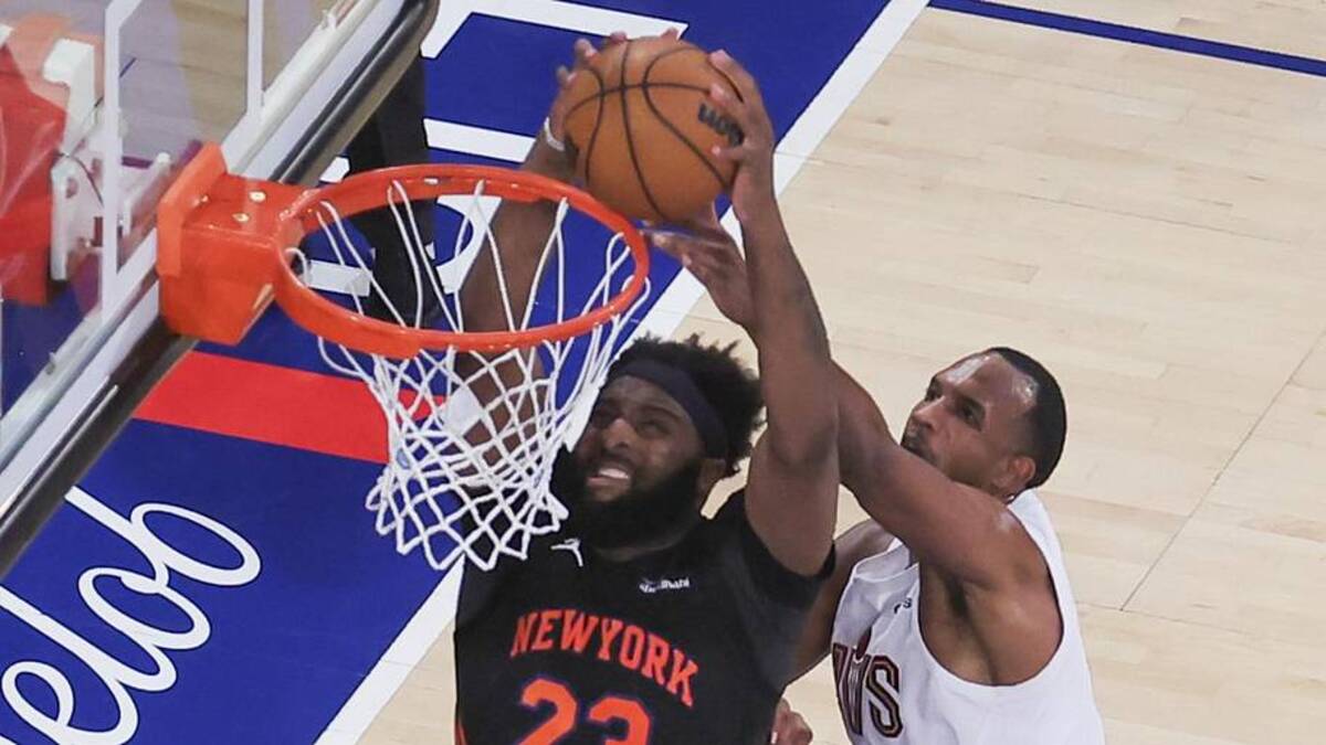  May 21, 2026; New York, New York, USA; New York Knicks center Mitchell Robinson (23) dunks against Cleveland Cavaliers center Evan Mobley (4) during the third quarter of game two of the Eastern Conference Finals during the 2026 NBA at Madison Square Garden. Mandatory Credit: Brad Penner-Imagn Images | Brad Penner-Imagn Images 