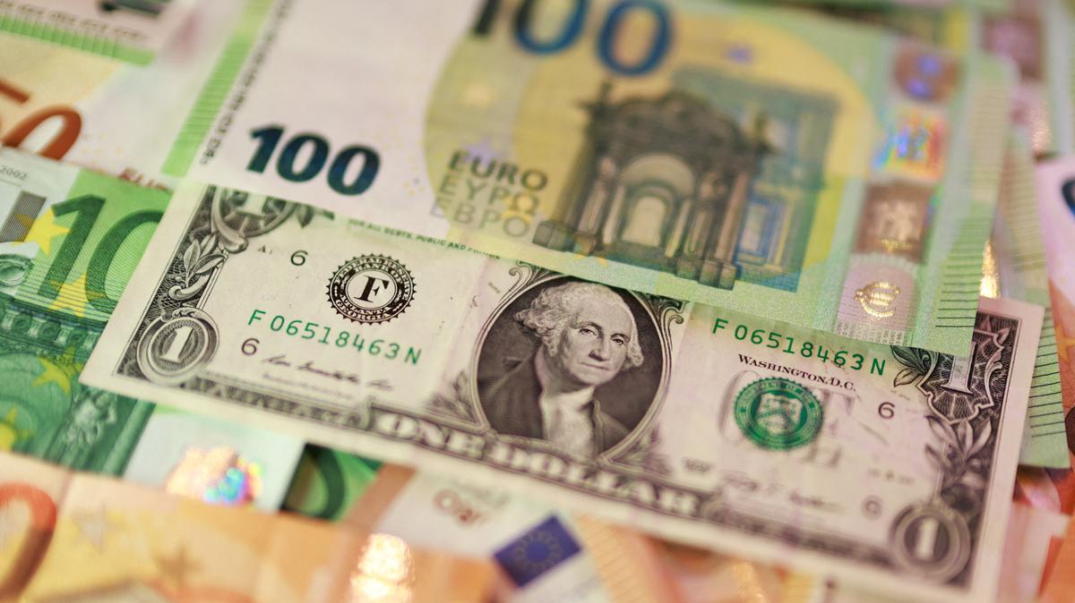 U.S. dollar and Euro banknotes are seen in this illustration taken March 24, 2026. REUTERS/Dado Ruvic/Illustration