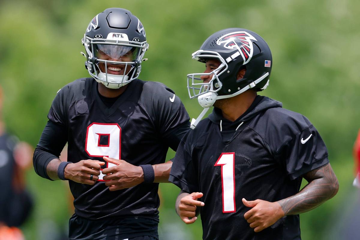  QBs Michael Penix Jr. and Tua Tagovailoa are competing for the same starting job. 