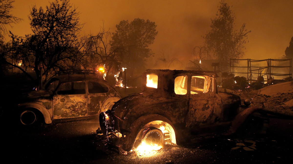 Classic cars burn in Paradise, California, as a the Camp Fire rages through Butte County, on Thursday, Nov. 8, 2018. (Karl Mondon/Bay Area News Group/TNS)