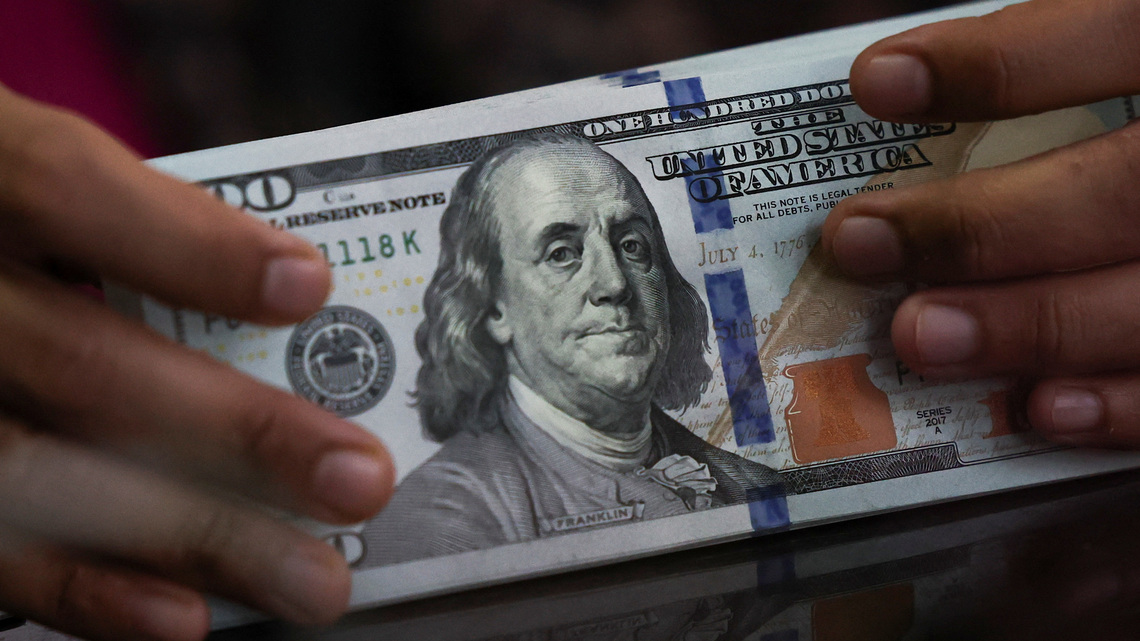 Dollar ticks up on Iran tensions, with US data in focus 