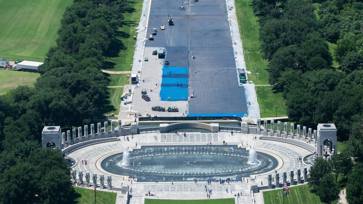 Workers continue to paint the Reflecting Pool in front of Lincoln Memorial on Friday. The repainting of the landmark is part of President Donald Trump's effort to repair Washington landmarks in preparation for the country's 250th birthday this summer. Photo by Aaron Schwartz/UPI