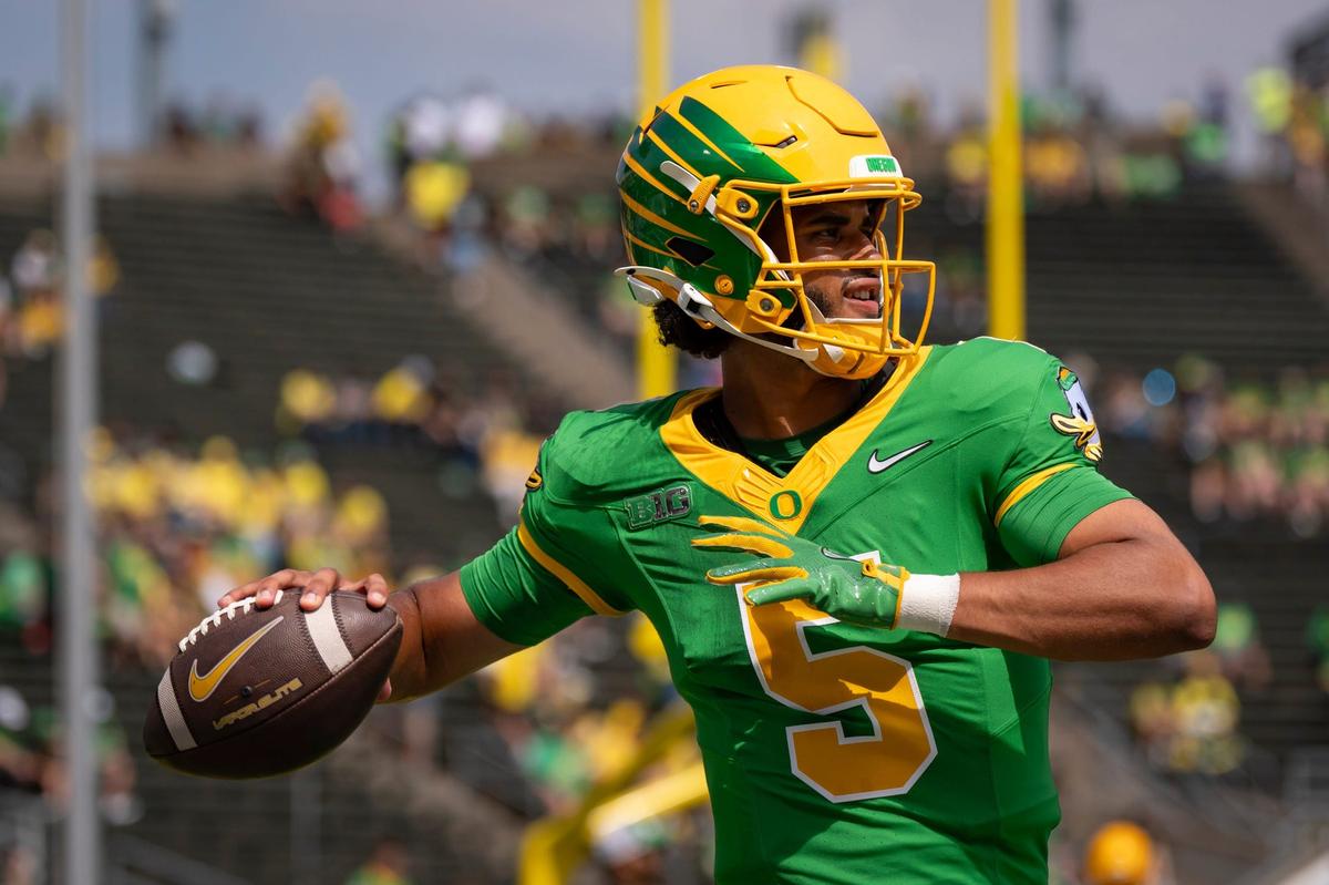 Oregon quarterback Dante Moore throws a pass during warmups as the Oregon Ducks host the Montana State Bobcats on Aug. 30, 2025, at Autzen Stadium in Eugene, Oregon.