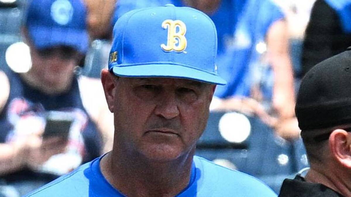  Jun 14, 2025; Omaha, Neb, USA; Murray State Racers head coach Dan Skirka and UCLA Bruins head coach John Savage meet with umpires before the game at Charles Schwab Field. Mandatory Credit: Steven Branscombe-Imagn Images | Steven Branscombe-Imagn Images 