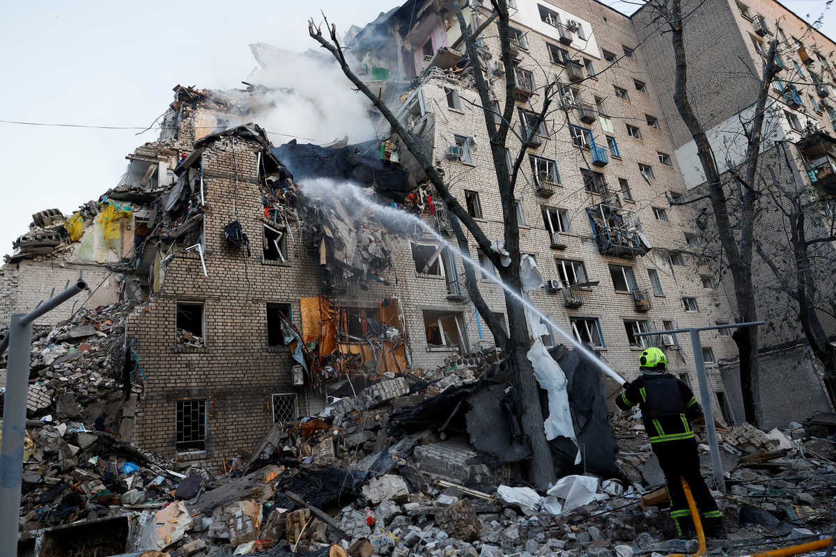A firefighter works at the site of an apartment building damaged during overnight Russian missile and drone strikes, amid Russia’s attack on Ukraine, in Kyiv, Ukraine, July 2, 2026. REUTERS/Valentyn Ogirenko