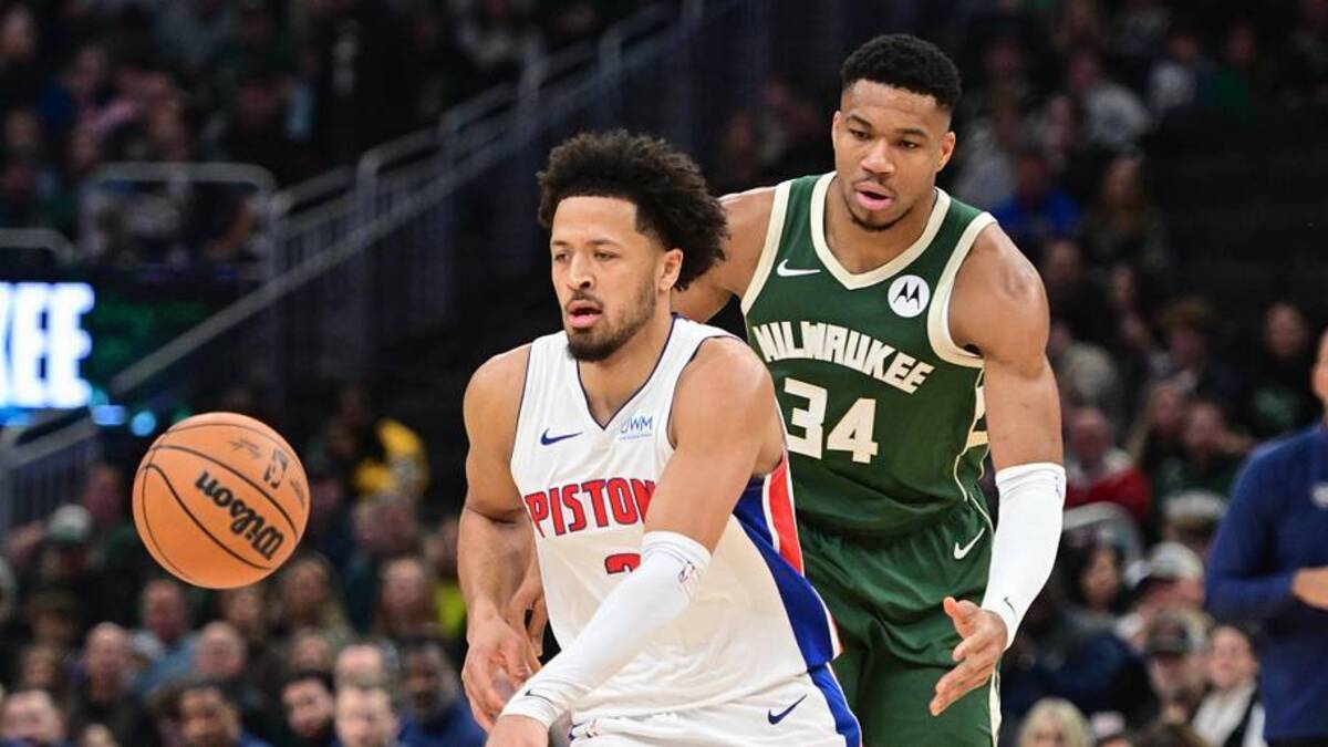  Dec 16, 2023; Milwaukee, Wisconsin, USA; Detroit Pistons guard Cade Cunningham (2) is guarded by Milwaukee Bucks forward Giannis Antetokounmpo (34) in the first quarter at Fiserv Forum. Mandatory Credit: Benny Sieu-Imagn Images | Benny Sieu-Imagn Images 
