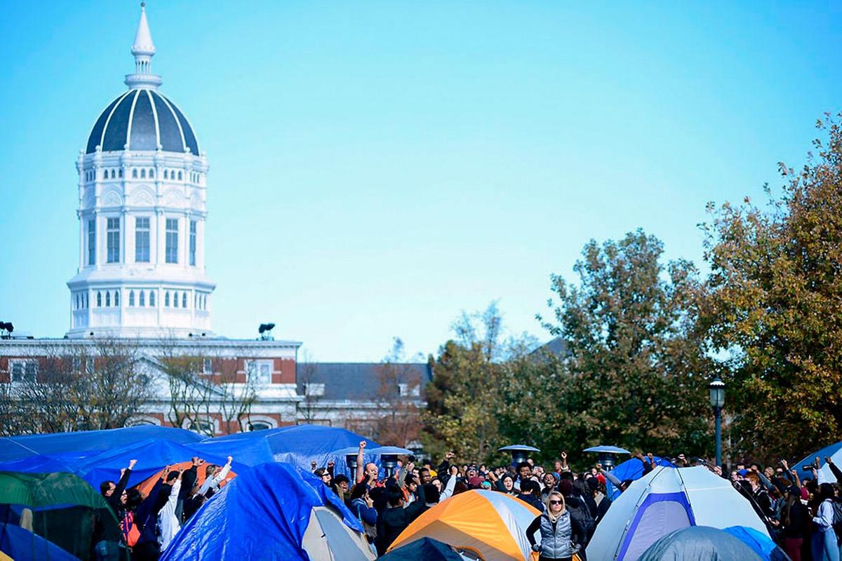 People celebrate the end of Jonathan Butler's hunger strike the morning of Nov. 9, 2015, after UM System President Tim Wolfe officially resigned. "For me, especially with faith in God, I really didn't look at it from a deficit approach that I would die - even though I took precautions that I might - I really did come at this with an approach of victory, knowing that the fact that the harder we fight, the greater the reward," he said in an interview with CNN.
