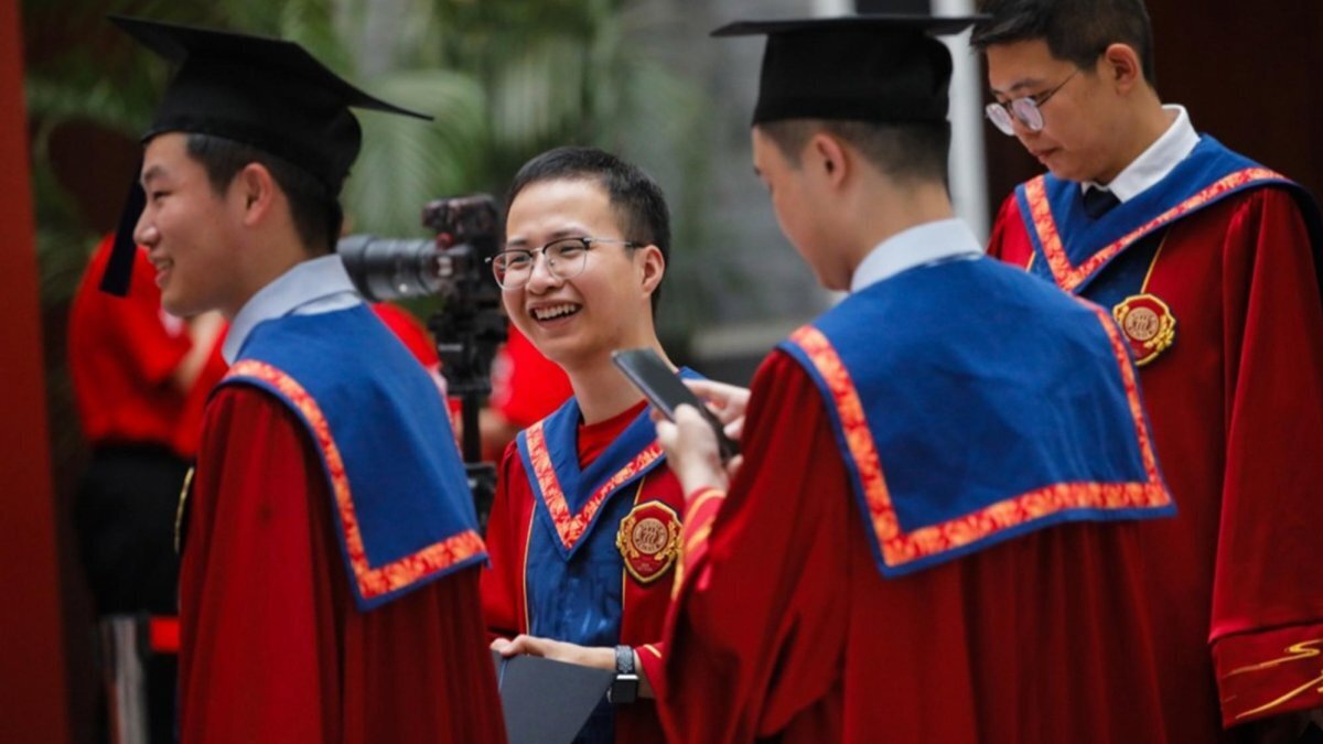 Undergraduate and master's graduates attend the degree awarding ceremony at Renmin University in Beijing, China. Photo by WU HAO / EPA