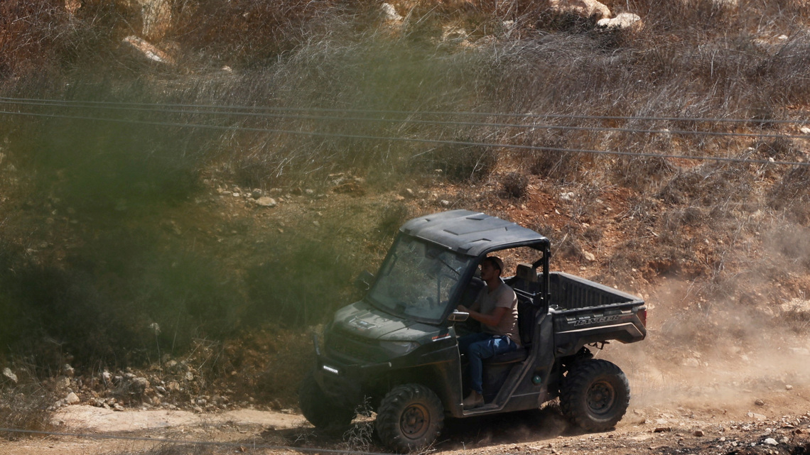 Israeli settlers attack West Bank village, blocking family's return home
