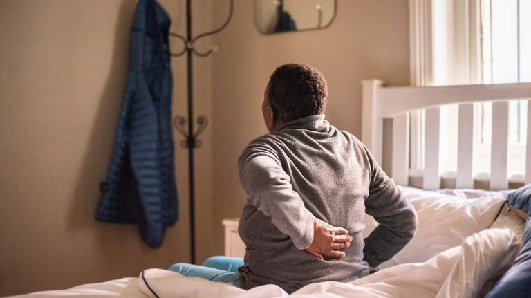 Lower Back Pain in the Morning? Here’s Why—and How To Get Relief Fast