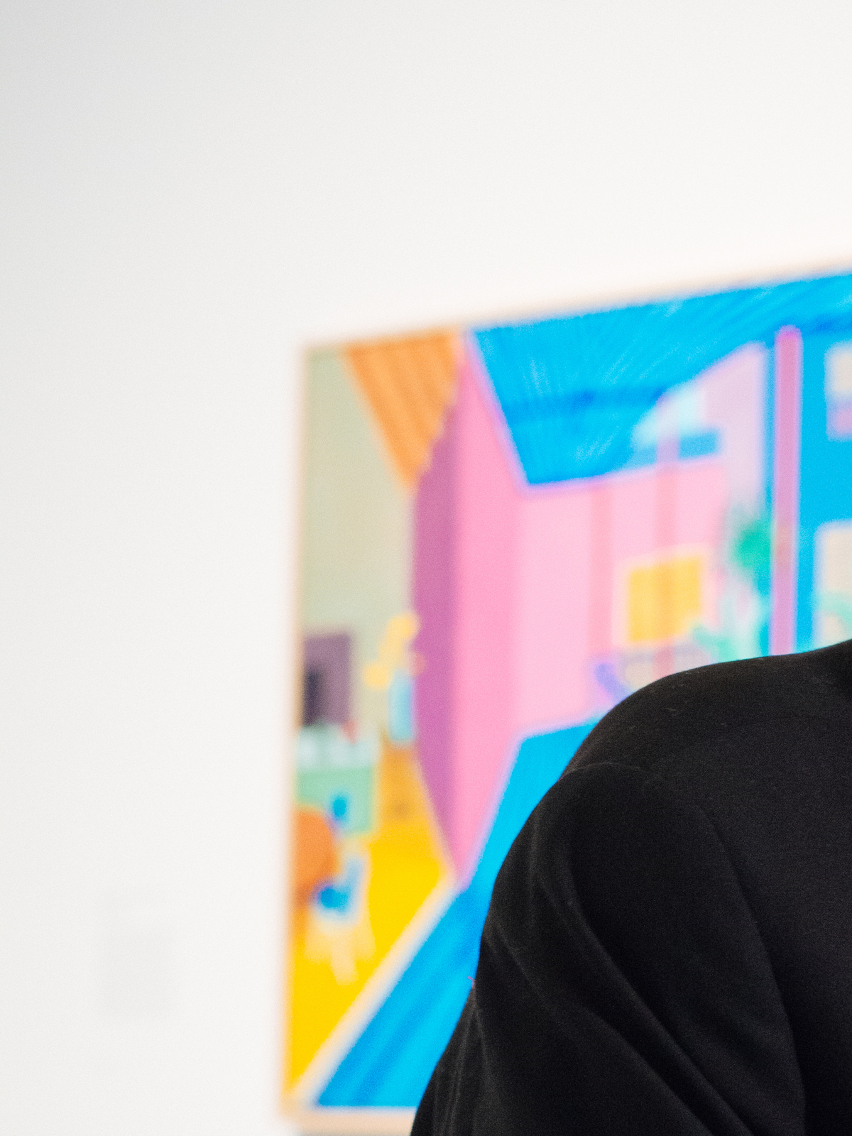 FILE -- The artist David Hockney, at a retrospective of his works at the Metropolitan Museum of Art in New York, Nov. 20, 2017. Hockney, whose colorful figurative paintings were both conservative and iconoclastic, defying the dominant abstract schools of the mid-20th century, died at home in London on June 11, 2026. He was 88. (Charlie Rubin/The New York Times)