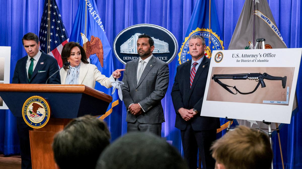 FILE PHOTO: U.S. Attorney for the District of Columbia Jeanine Pirro points at a picture of a shotgun carried by Cole Tomas Allen, the suspect in the shooting incident in Washington at the annual White House Correspondents' Association dinner, as she and acting Attorney General Todd Blanche, U.S. Federal Bureau of Investigation (FBI) Director Kash Patel, Assistant Director in Charge (ADIC) of the FBI Washington Field Office Darren Cox take part in a press conference about the shooting incident, at the U.S. Department of Justice, in Washington, D.C., U.S., April 27, 2026. REUTERS/Kylie Cooper/File Photo