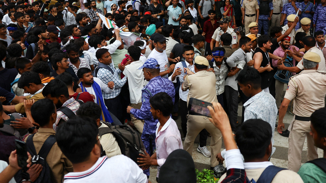 India's cockroach movement supporters gather to march despite police ban 