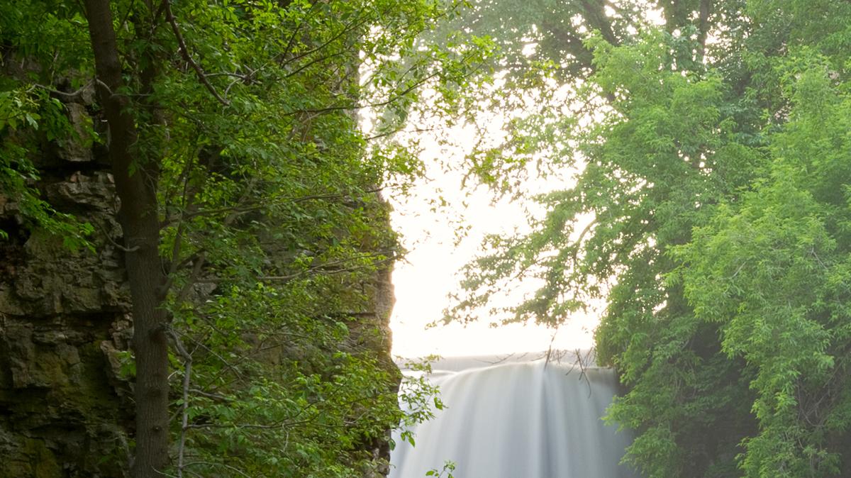 Below Vermillion Falls along the banks of Vermillion River in Hastings, Minnesota.