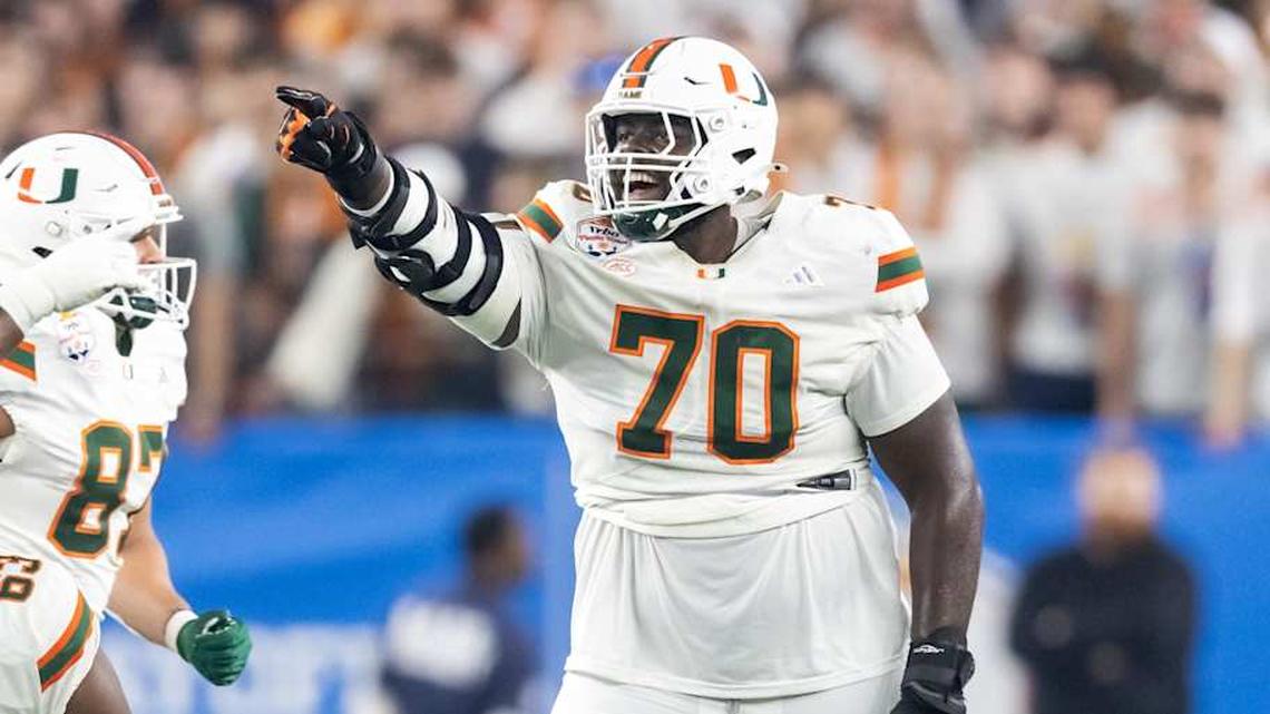  Jan 8, 2026; Glendale, AZ, USA; Miami Hurricanes offensive lineman Markel Bell (70) against the Mississippi Rebels during the 2026 Fiesta Bowl and semifinal game of the College Football Playoff at State Farm Stadium. Mandatory Credit: Mark J. Rebilas-Imagn Images | Mark J. Rebilas-Imagn Images 