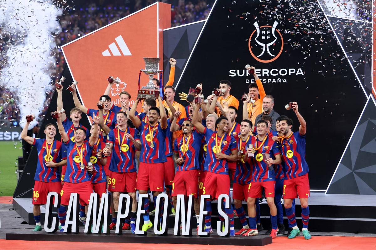  Ronald Araujo of FC Barcelona lifts the Spanish Super Cup following their side's victory in the Spanish Super Cup Final between FC Barcelona and Real Madrid at King Abdullah Sports City Hall Stadium on January 11, 2026 in Jeddah, Saudi Arabia. (Photo by Yasser Bakhsh/Getty Images) Photo by Yasser Bakhsh/Getty Images