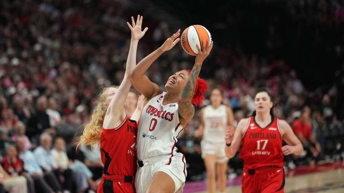 Shakira Austin nets 31, Mystics secure playoff berth by beating Fire 
