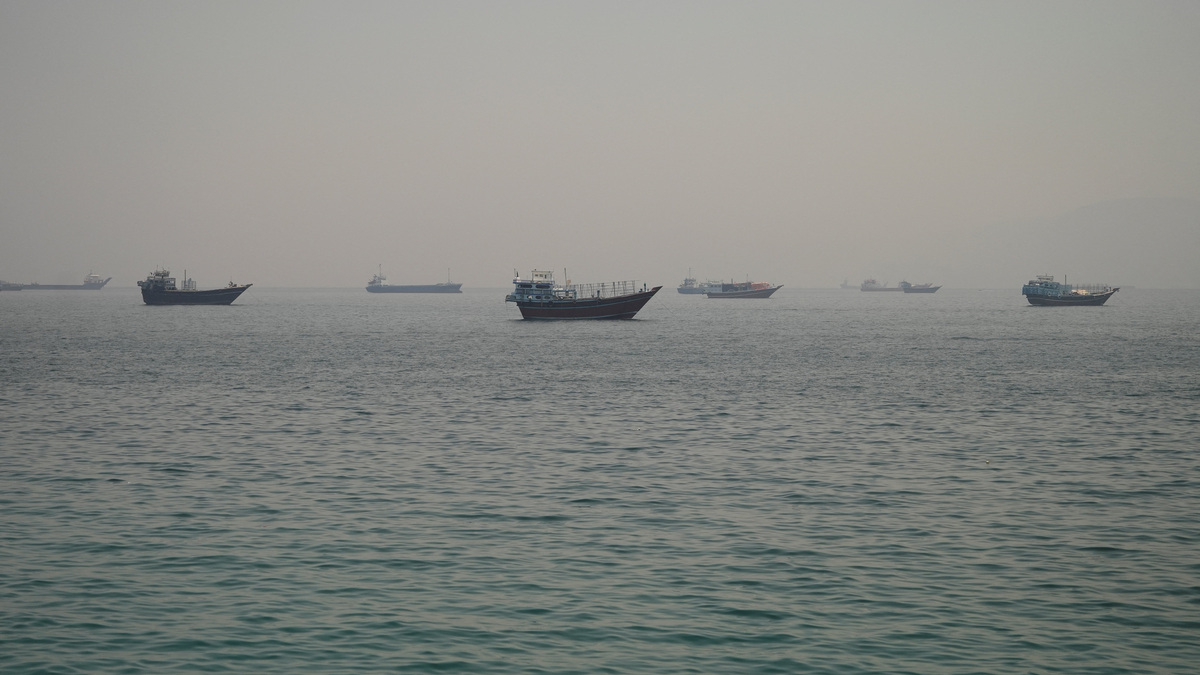 Vessels are anchored in the Strait of Hormuz, as seen from Musandam, Oman, June 11, 2026. REUTERS/Stringer