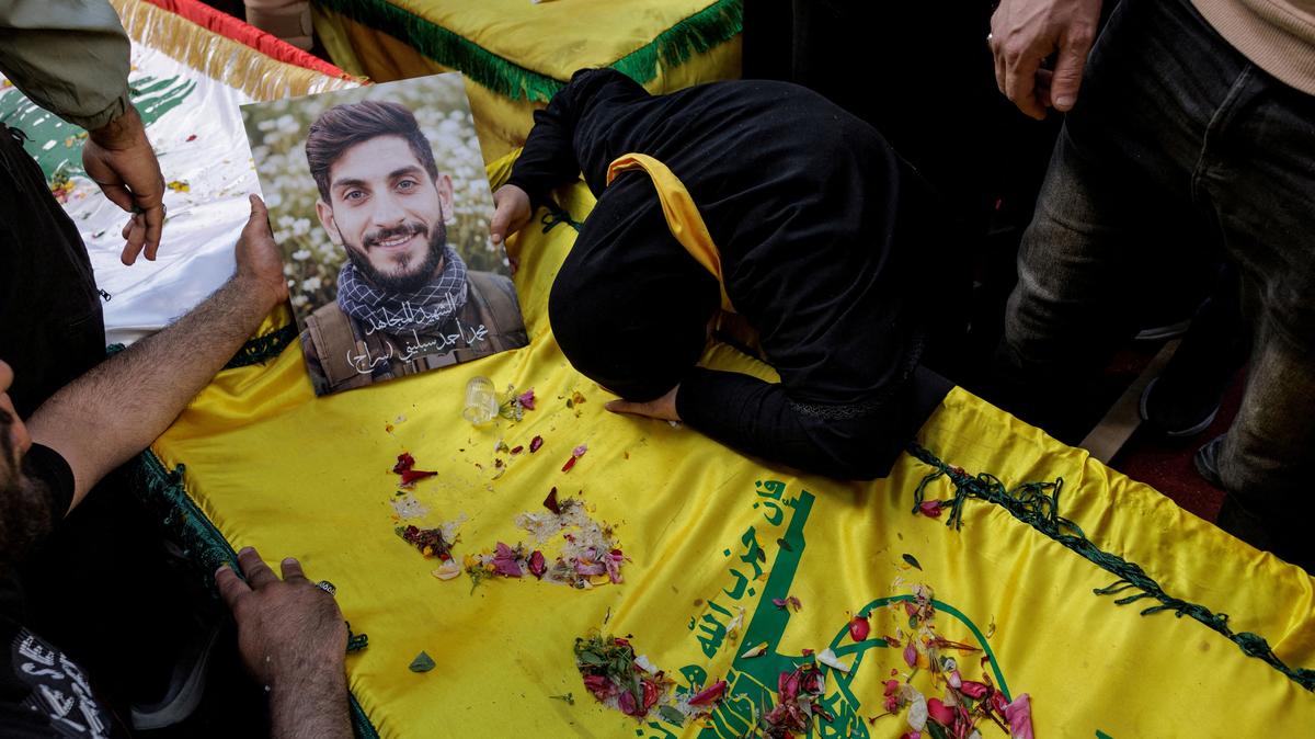 FILE PHOTO: Aida Abou Khalil mourns her son, Mohamed Ahmed Seblini, a Hezbollah fighter killed during the conflict with Israel, during his funeral, amid a 10-day ceasefire between Lebanon and Israel, in Qlaileh, Southern Lebanon, April 21, 2026. REUTERS/Zohra Bensemra/File Photo