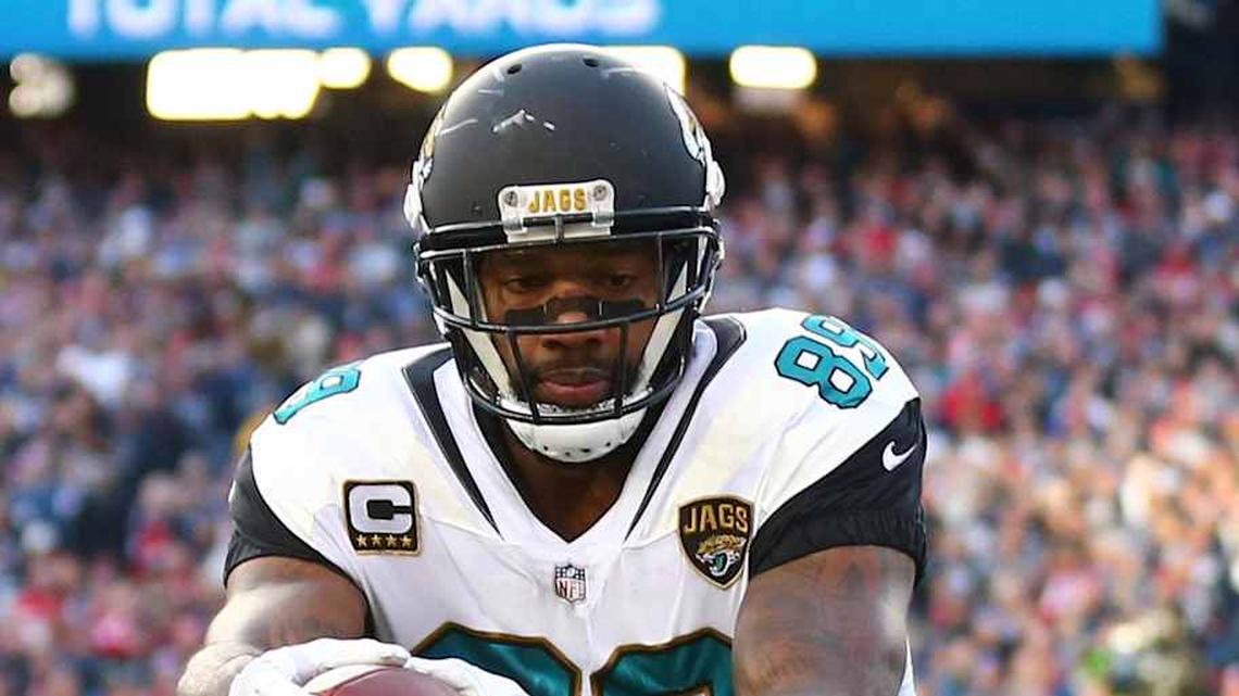  Jan 21, 2018; Foxborough, MA, USA; Jacksonville Jaguars tight end Marcedes Lewis (89) catches a touchdown pass over New England Patriots strong safety Patrick Chung (23) in the second quarter of the AFC Championship Game at Gillette Stadium. Mandatory Credit: Mark J. Rebilas-Imagn Images | Mark J. Rebilas-Imagn Images 