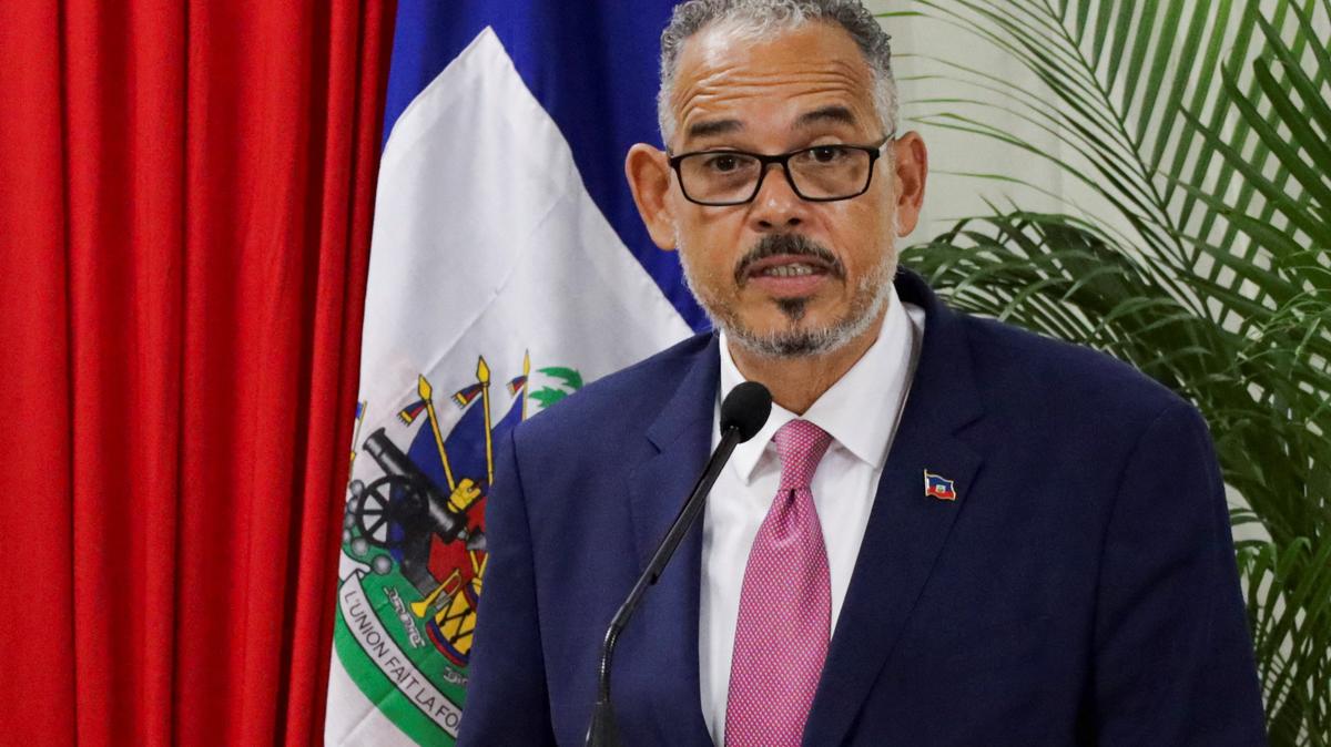 FILE PHOTO: Haiti's Prime Minister Alix Didier Fils Aime speaks during a ceremony on the day the mandate of the Caribbean nation's transitional governing council, a body intended to curb a bloody gang conflict and bring about long-delayed elections, ended with no succession plan in place, in Port-au-Prince, Haiti, February 7, 2026. REUTERS/Fildor Pq Egeder/File Photo