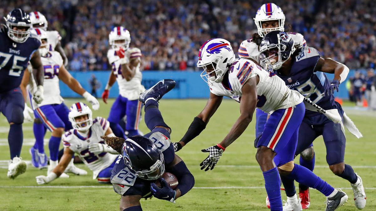 Tennessee Titans running back Derrick Henry (22) dives into the end zone as he scores a touchdown on a 13-yard run against the Buffalo Bills in the second half of an NFL football game Monday, Oct. 18, 2021, in Nashville, Tennessee.