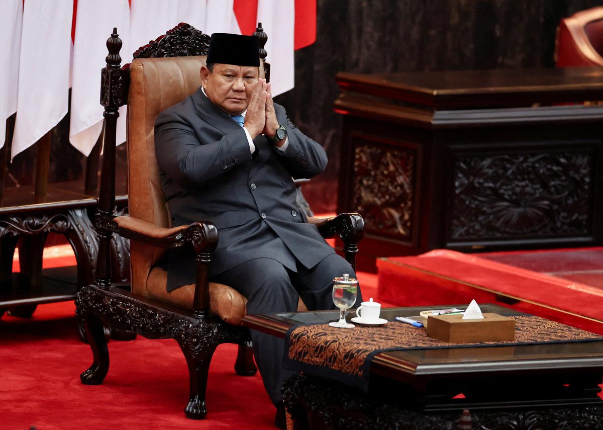 Indonesian President Prabowo Subianto gestures inside the parliament building on the day he is set to deliver his speech on economic policies and the 2027 fiscal plan in Jakarta, Indonesia, May 20, 2026. REUTERS/Willy Kurniawan