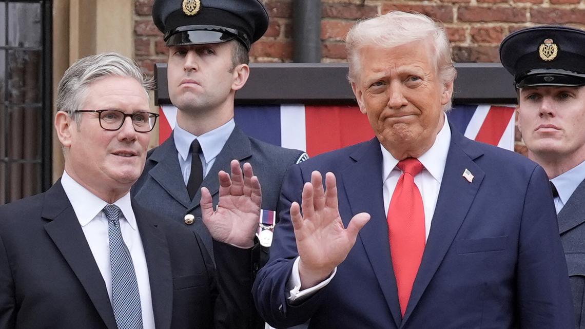 Britain's Prime Minister Keir Starmer, left, and U.S. President Donald Trump wave after his arrival at Chequers, in Aylesbury, central England, on Sept. 18, 2025, on the second day of the U.S. President's second State Visit. (Stefan Rousseau/Pool/AFP/Getty Images/TNS)