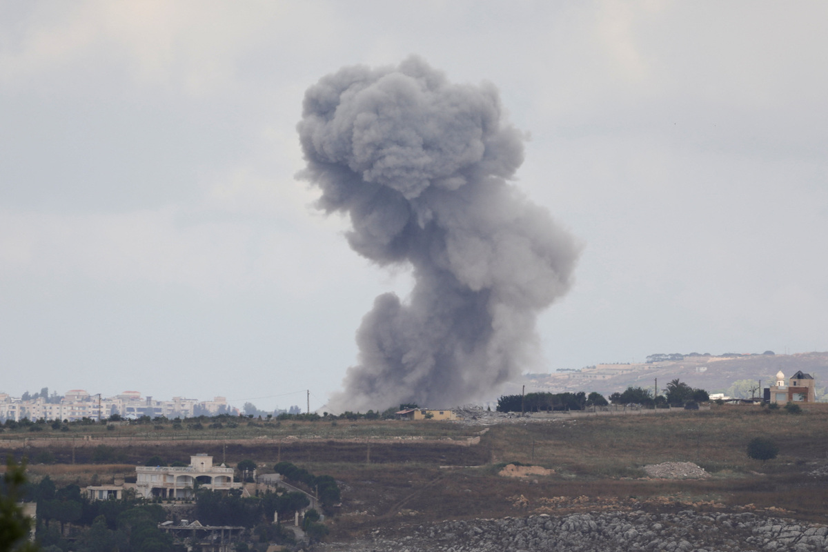 Smoke billows from southern Lebanon following an Israeli strike, as seen from Marjayoun, Lebanon, June 14, 2026. REUTERS/Stringer