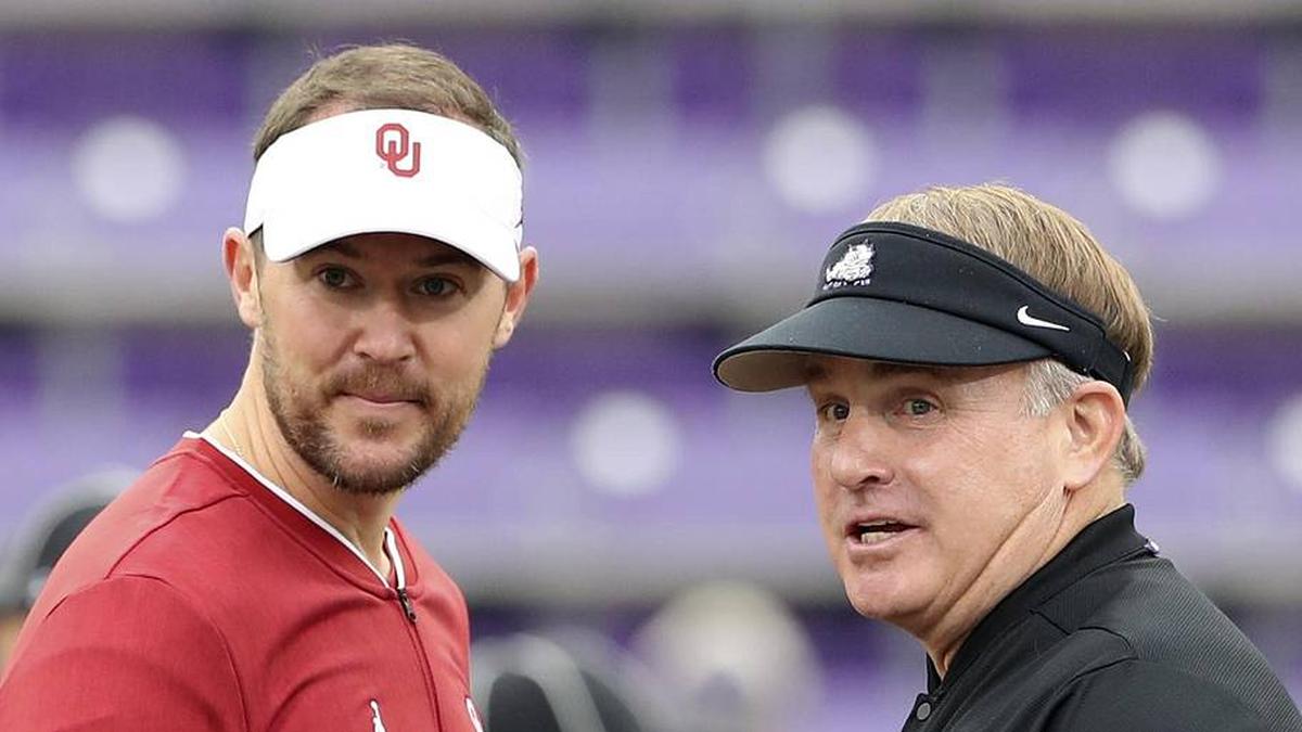  Oct 20, 2018; Fort Worth, TX, USA; Oklahoma Sooners head coach Lincoln Riley (left) and TCU Horned Frogs head coach Gary Patterson speak before the game at Amon G. Carter Stadium. Mandatory Credit: Kevin Jairaj-Imagn Images | Kevin Jairaj-Imagn Images 