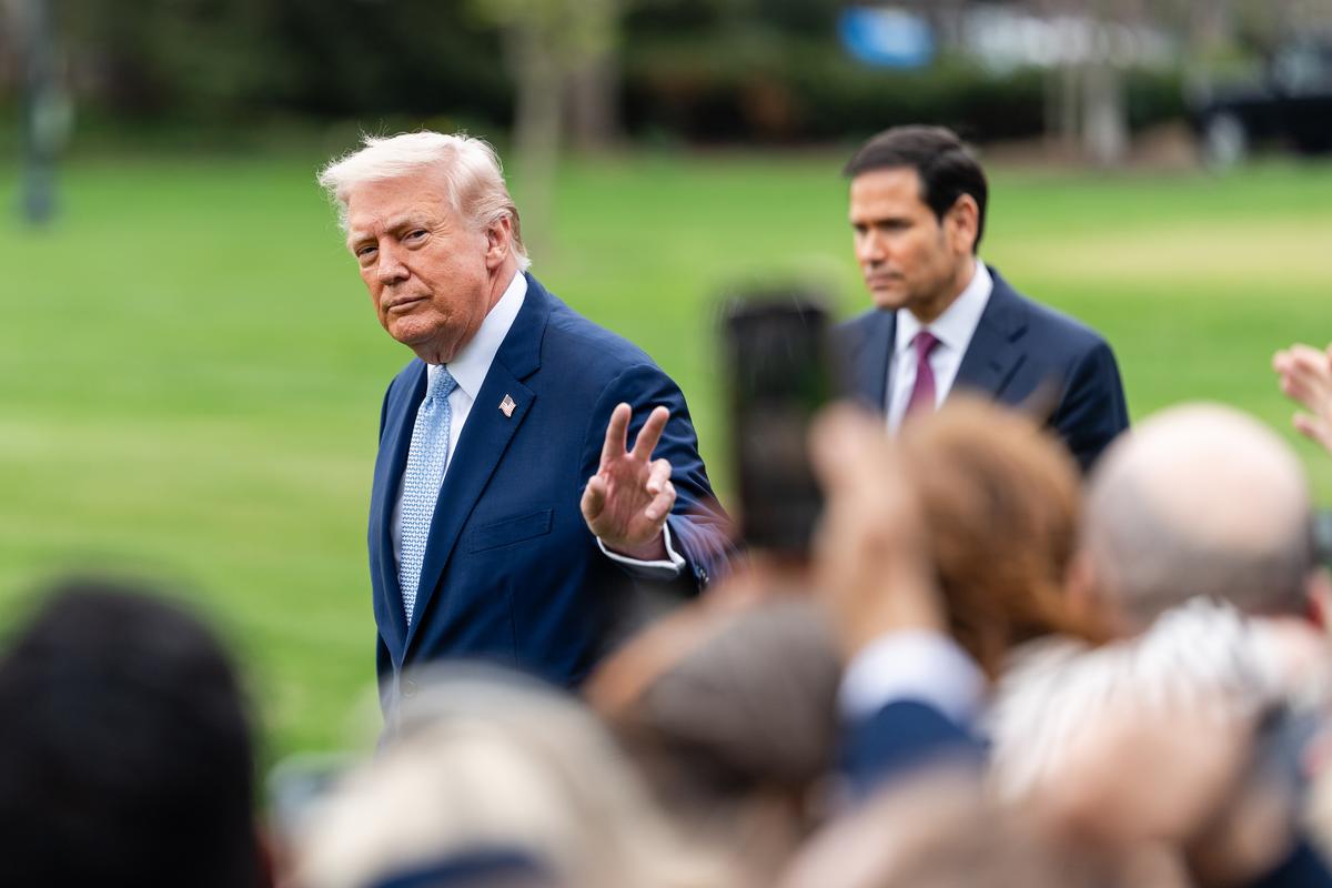 FILE -- President Donald Trump gestures before boarding Marine One outside of the White House in Washington, on Friday, March 20, 2026. As a senator, Marco Rubio hinted at the need for regime change in China. Now he talks about cooperation. (Eric Lee/The New York Times)