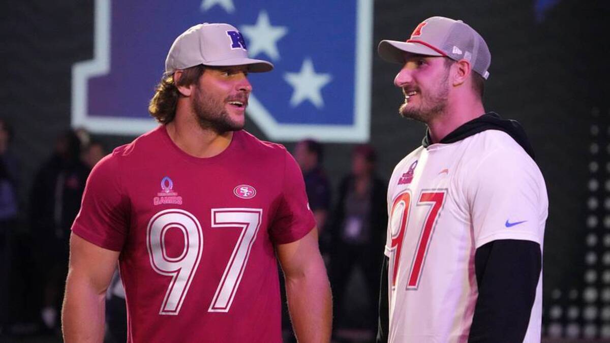  Jan 30, 2025; Orlando, FL, USA; NFC defensive end Nick Bosa of the San Francisco 49ers (left) with brother and AFC linebacker Joey Bosa during the Pro Bowl Skills Challenge at Nicholson Fieldhouse. Mandatory Credit: Kirby Lee-Imagn Images | Kirby Lee-Imagn Images 