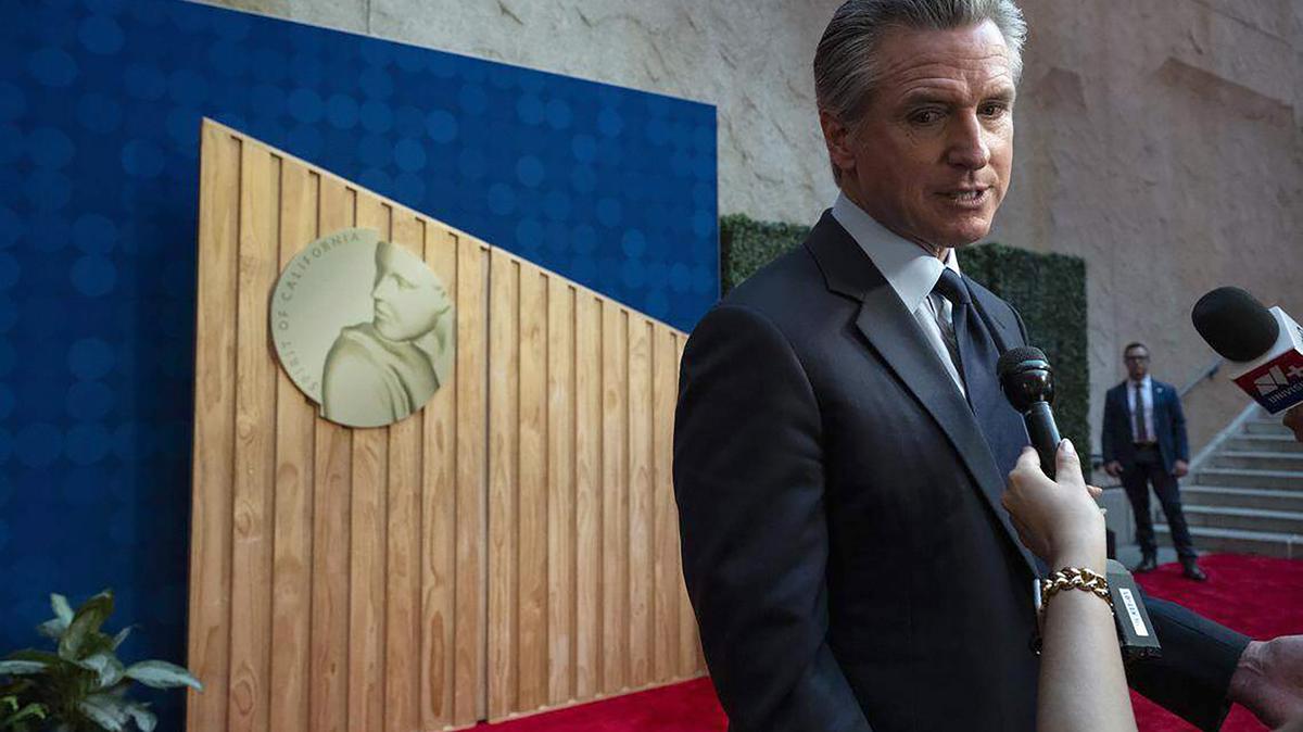 Gov. Gavin Newsom answers questions from the media on the red carpet before an induction ceremony of the 19th class of California Hall of Fame inductees at the California Museum in Sacramento on Thursday, March 19, 2026. (Hannah Ruhoff/The Sacramento Bee/TNS)