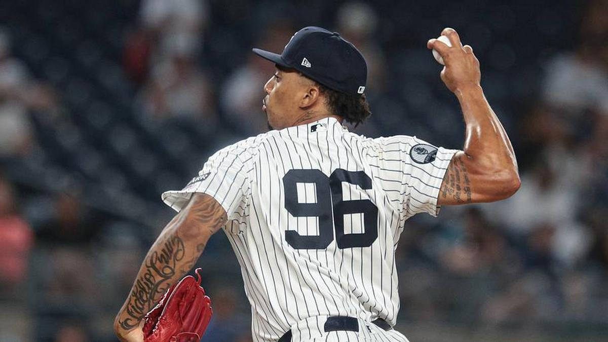  New York Yankees pitcher Yovanny Cruz (96) delivers a pitch, during his major league debut, against the Blue Jays in the eighth inning at Yankee Stadium. | Vincent Carchietta-Imagn Images 