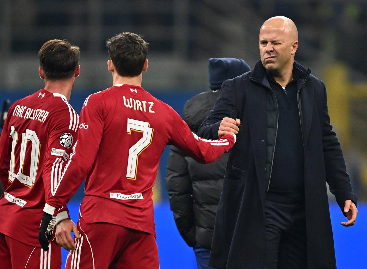  Arne Slot shakes hands with Florian Wirtz following the team's victory during the UEFA Champions League match between FC Internazionale Milano and Liverpool FC. Liverpool FC/Liverpool FC via Getty Images