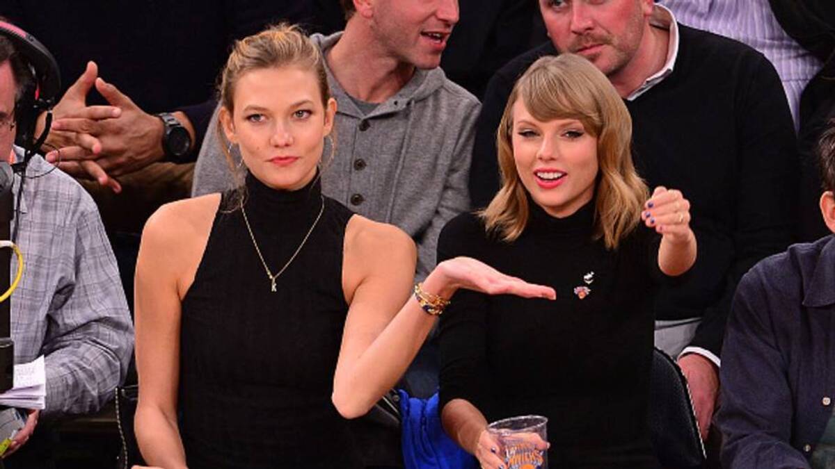  Taylor Swift attends a Knicks game in 2014 with her then-best friend Karlie Kloss. | James Devaney/GC Images 