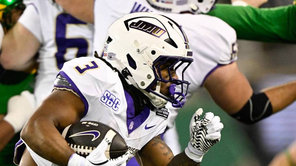  Dec 20, 2025; Eugene, OR, USA; James Madison Dukes running back Wayne Knight (3) rushes during the second quarter against the Oregon Ducks at Autzen Stadium. Mandatory Credit: Troy Wayrynen-Imagn Images | Troy Wayrynen-Imagn Images 