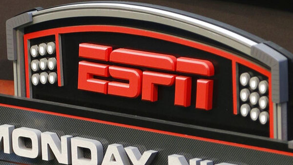 FILE - This Sept. 16, 2013, file photo shows the ESPN logo prior to an NFL football game between the Cincinnati Bengals and the Pittsburgh Steelers, in Cincinnati.