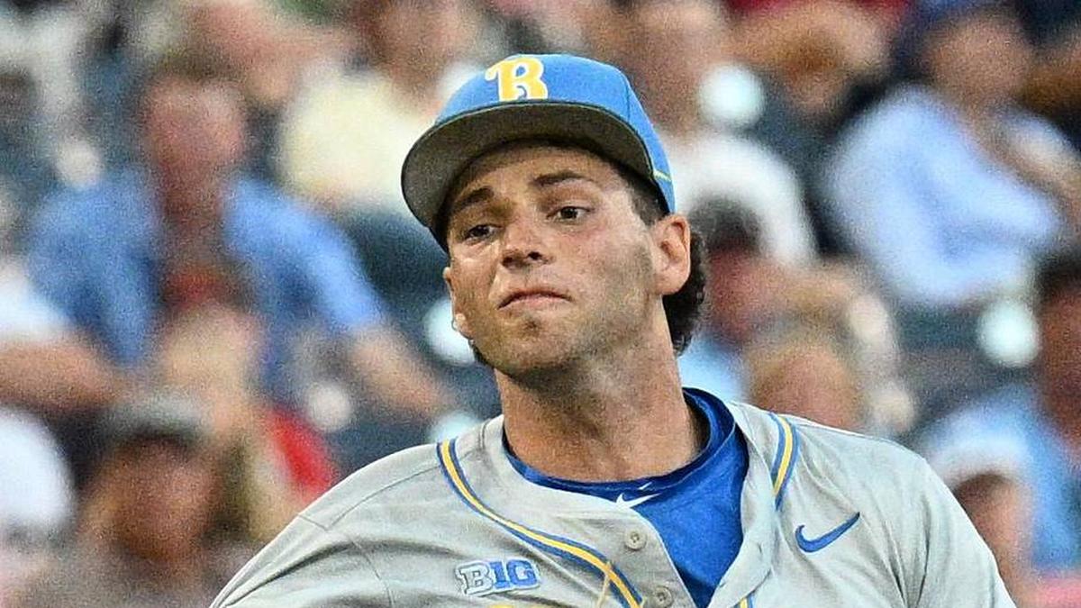  Jun 17, 2025; Omaha, Neb, USA; UCLA Bruins shortstop Roch Cholowsky (1) throws to first base against the Arkansas Razorbacks during the third inning at Charles Schwab Field. Mandatory Credit: Steven Branscombe-Imagn Images | Steven Branscombe-Imagn Images 