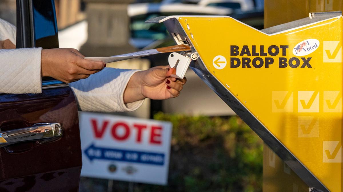 A voter puts their ballot for the 2024 Presidential Primary Election in the ballot drop box at the Vote Center located at the Orange Public Library in Orange, California, on March 5, 2024. (Mark Rightmire/Orange County Register/TNS)