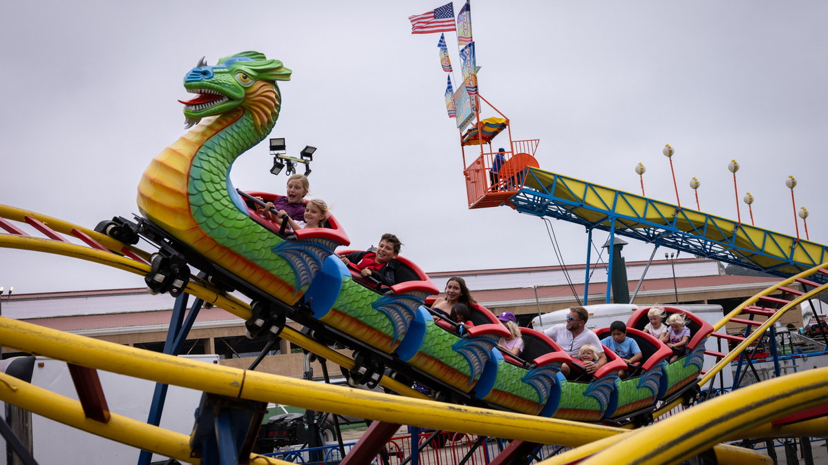 People ride the Dragon Wagon during opening day of the San Diego County Fair on Wednesday, June 11, 2025 in Del Mar.   (Ana Ramirez / The San Diego Union-Tribune)