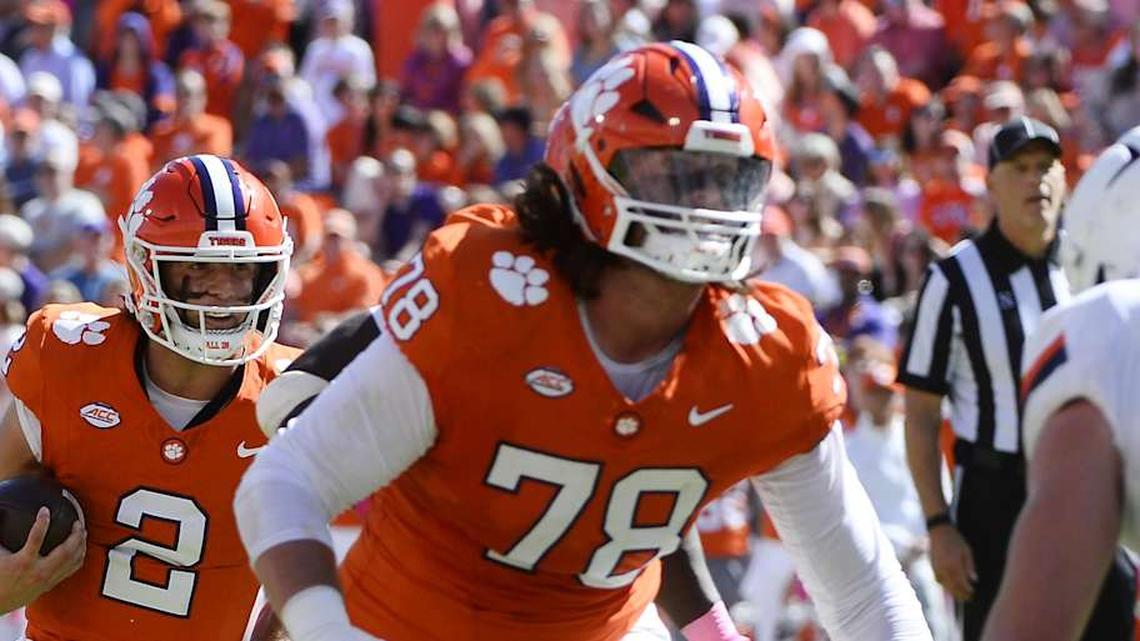  Oct 19, 2024; Clemson, South Carolina, USA; Clemson Tigers quarterback Cade Klubnik (2) follows offensive lineman Blake Miller (78) block down field against the Virginia Cavaliers at Memorial Stadium. Mandatory Credit: Alexander Hicks-Imagn Images | Alexander Hicks-Imagn Images 