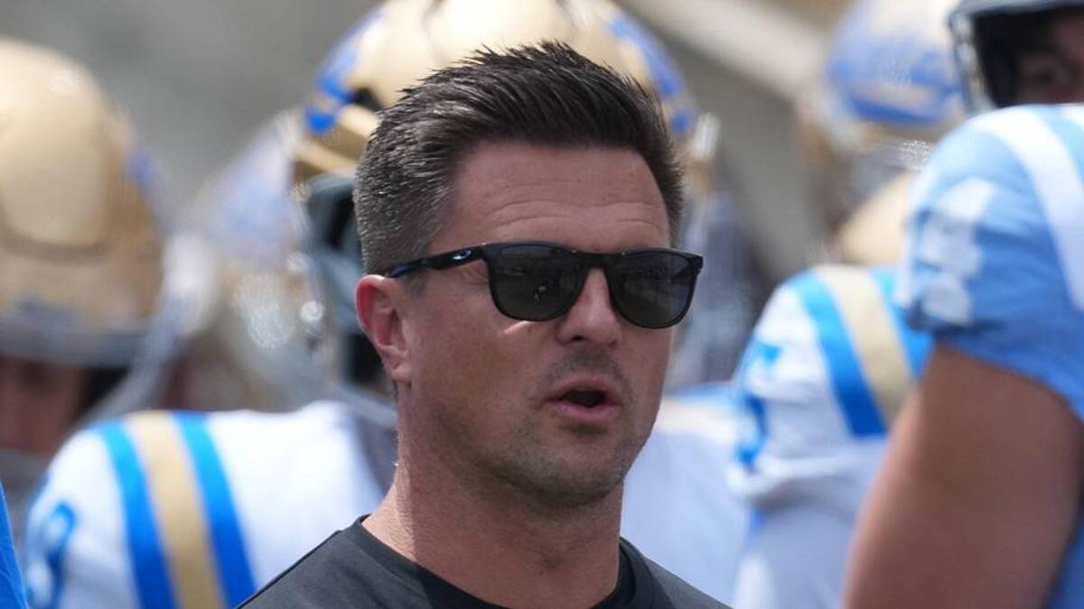  May 2, 2026; Pasadena, CA, USA; UCLA Bruins coach Bob Chesney (left) and son Bob Chesney watch during the spring game at Rose Bowl. Mandatory Credit: Kirby Lee-Imagn Images | Kirby Lee-Imagn Images 