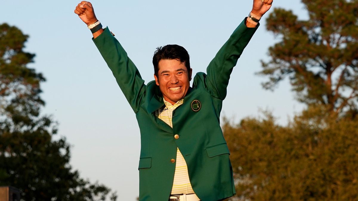 FILE -Hideki Matsuyama of Japan celebrates after putting on the champion’s green jacket after winning the Masters golf tournament on Sunday, April 11, 2021, in Augusta, Ga. Matsuyama has been a mentor to No. 1 amateurs Takumi Kanaya and Keita Nakajima. All three are playing the Sony Open this week. (AP Photo/Gregory Bull, File)