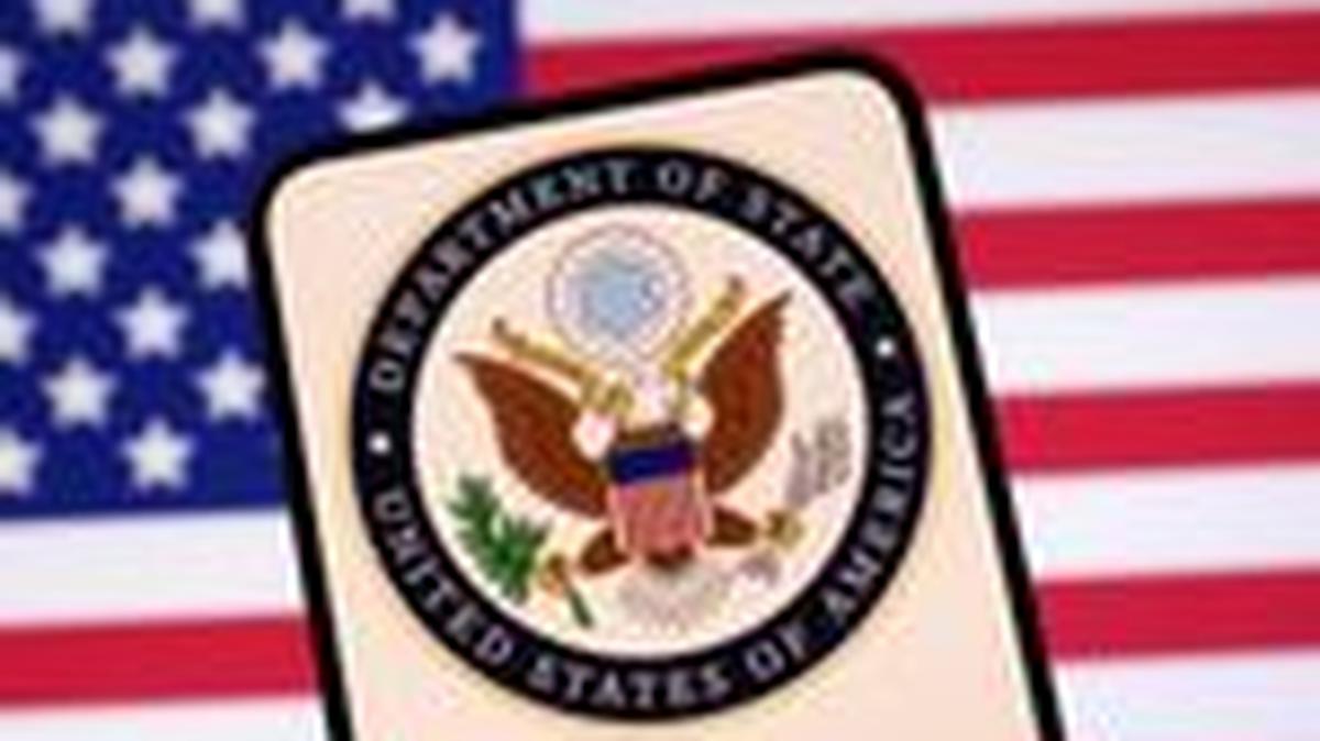 United States Department of State logo and U.S. flag are seen in this illustration taken April 23, 2025. REUTERS/Dado Ruvic/Illustration