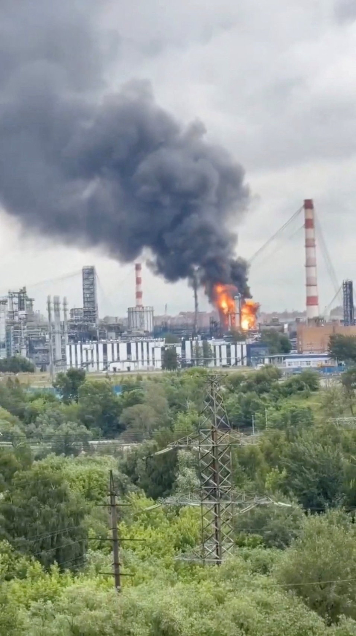 Flames and smoke rise from a facility at an oil refinery following a Ukrainian drone attack, in Moscow, Russia, June 16, 2026, in this screen grab taken from a social media video. Social Media/via REUTERS