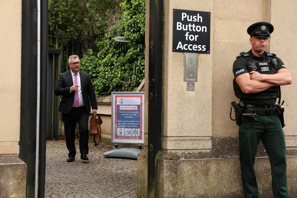 Jeffrey Donaldson, former leader of the Democratic Unionist Party (DUP), charged with historical sex offences, leaves the Newry Courthouse as he appeared for trial, in Newry, Northern Ireland, June 17, 2026. REUTERS/Cathal McNaughton