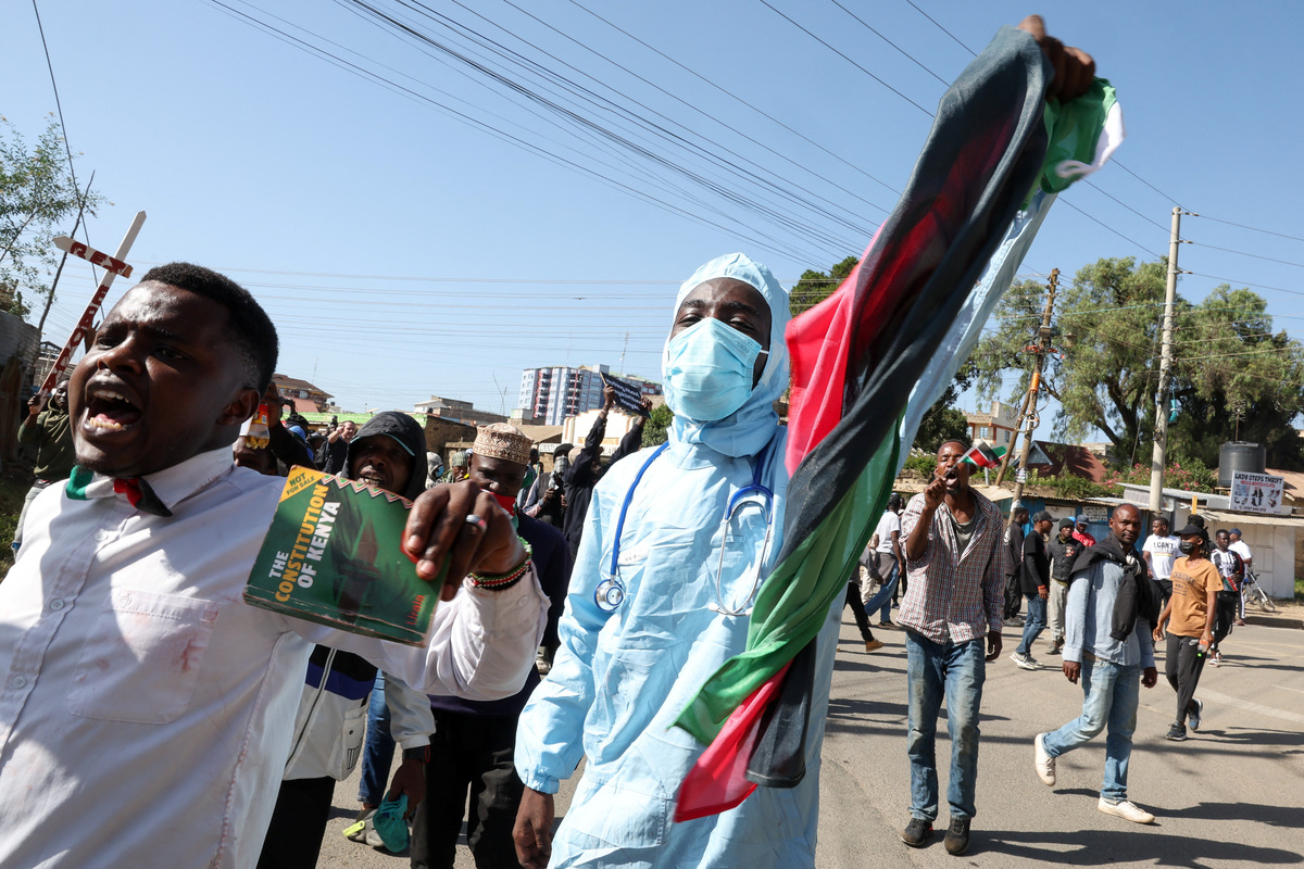 Demonstrators take part in a protest against a U.S.-backed Ebola quarantine plan to establish a 50-bed facility at a Kenyan air force base intended to host Americans exposed to Ebola, in Nanyuki town, Laikipia County, Kenya, June 9, 2026. REUTERS/Monicah Mwangi