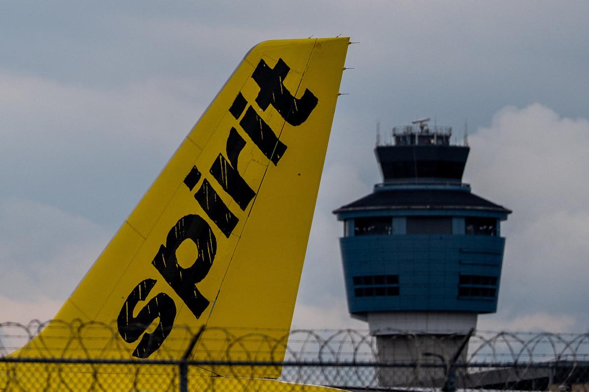 A Spirit Airline plane sits on the tarmac at LaGuardia Airport in Queens, in New York City, U.S., May 2, 2026. REUTERS/David 'Dee' Delgado